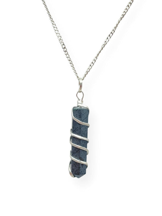 Raw hematite crystal pendant necklace on a silver-plated chain